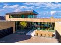 Contemporary desert home with expansive windows and courtyard at 7 Stoneshead Ct, Henderson, NV 89012