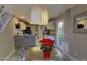 Charming dining room featuring an updated kitchen and a stylish light fixture at 3368 Epson St, Las Vegas, NV 89129