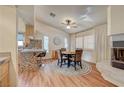 Cozy dining room area with a ceiling fan, nice flooring and natural light at 2035 E Warm Springs Rd # 1019, Las Vegas, NV 89119