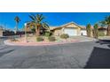 Beautiful single-story home with a three-car garage and desert landscaping in a well-maintained community at 2035 E Warm Springs Rd # 1019, Las Vegas, NV 89119