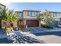 Charming two-story home with a well-manicured lawn, a two-car garage, and inviting curb appeal at 2947 Caxton Grove Dr, Henderson, NV 89052