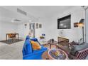 Living room with fireplace and seating area at 5330 Duralite St # 102, Las Vegas, NV 89122