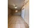 Bright bedroom with tile flooring and ample closet space at 1504 E Mcwilliams Ave, Las Vegas, NV 89101