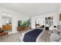 Serene main bedroom with ample closet space, a mid-century modern dresser and calming decor at 3427 Manzano Cir, Las Vegas, NV 89121