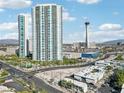 Scenic aerial view showcases the neighborhood with a skyline and distant mountain views at 322 Karen Ave # 206, Las Vegas, NV 89109