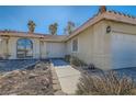 Front entry and walkway of a single-story house with gated entry at 3189 Lipton Ct, Las Vegas, NV 89121