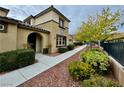 Two-story home with walkway and landscaping at 11416 Belmont Lake Dr # 102, Las Vegas, NV 89135