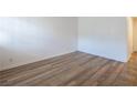 Neutral bedroom with wood-look flooring, crisp white walls, and minimal design at 204 Orland St # 2, Las Vegas, NV 89107