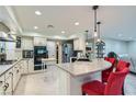 Spacious kitchen featuring an island, stainless steel appliances, and granite countertops at 5205 Sandy Cactus Ln, Las Vegas, NV 89149