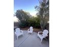 Small fenced patio with seating area and plants at 2760 Stargate St, Las Vegas, NV 89108