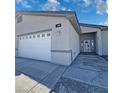 Front view of the house, showcasing the garage and entrance at 2750 Zephyr Ave, Pahrump, NV 89048