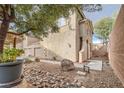 Landscaped front yard with a walkway leading to the house entrance at 9790 Overlook Ridge Ave, Las Vegas, NV 89148