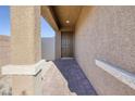 Covered entryway with a brick paved walkway leading to the front door at 3506 Judson Ave, Las Vegas, NV 89115