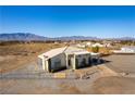 Two-story house with mountain views and large yard at 3490 S Adobe Ct, Pahrump, NV 89048