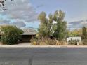 Street view of a single story home with a garage at 1552 Dorothy Ave, Las Vegas, NV 89119