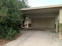 View of a two-car garage with concrete driveway at 1552 Dorothy Ave, Las Vegas, NV 89119