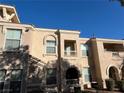 Townhome exterior showcasing multiple units and balconies at 10550 W Alexander Rd # 2149, Las Vegas, NV 89129