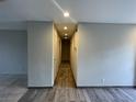 Long hallway with wood-look tile flooring at 2529 Rialto Rd, Las Vegas, NV 89108