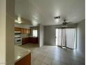 Eat-in kitchen with wood cabinets and tile flooring at 2529 Rialto Rd, Las Vegas, NV 89108