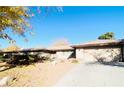 Ranch-style home with attached garage and a well-maintained yard at 3690 S Rosecrest Cir, Las Vegas, NV 89121