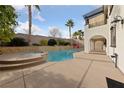 Relaxing pool and spa with water features, creating an oasis at 12253 Bluebird Canyon Pl, Las Vegas, NV 89138