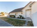 Front entrance of the house with walkway and landscaping at 2525 Kirkmichael Ln, Henderson, NV 89014