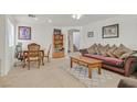 Spacious living room with wooden furniture and a bookcase at 6058 Ambleshire Ave, Las Vegas, NV 89139