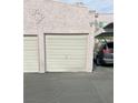 Two-car garage with automatic door and car parked at 1904 Las Palmas Ln # 203, Laughlin, NV 89029