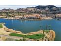 Modern lakefront homes with golf course and mountain views at 42 Promenade Isle Ln, Henderson, NV 89011