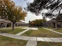 Community features a playground and well-maintained landscaping at 2521 Sierra Luna Ave # 106, Las Vegas, NV 89106