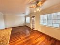 Bright living room with hardwood floors and lots of natural light at 2521 Sierra Luna Ave # 106, Las Vegas, NV 89106