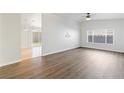 Spacious living room featuring wood-look flooring and lots of natural light at 412 Vassar Ln, Las Vegas, NV 89107