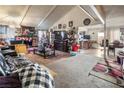 Open living area with vaulted ceiling and fireplace at 4245 Seville St, Las Vegas, NV 89121