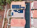 Top-down aerial view highlighting the property's roof, solar panels, and proximity to neighboring houses at 3023 Sunset Harbor Ct, North Las Vegas, NV 89031