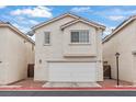 Charming two-story home with a well-maintained front yard and attached garage at 3023 Sunset Harbor Ct, North Las Vegas, NV 89031