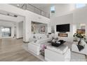 Spacious living room featuring a modern fireplace and high ceilings at 31 Vista Outlook St, Henderson, NV 89011