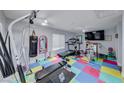 Fully equipped home gym with various exercise machines at 5527 Breecher Ave, Las Vegas, NV 89131