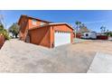 Attached garage with ample space for vehicles and storage at 1818 Waldman Ave, Las Vegas, NV 89102