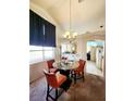 Charming dining area with glass-top table and seating for four at 3340 N Campbell Rd, Las Vegas, NV 89129