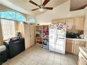 Kitchen boasts ample wood cabinets and a spacious layout at 3340 N Campbell Rd, Las Vegas, NV 89129