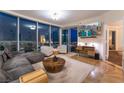 Modern living room with a city view, comfortable seating, and a flat-screen TV at 322 Karen Ave # 3707, Las Vegas, NV 89109