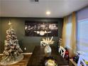 Dining room featuring a large Vegas-themed artwork at 3029 Camino Sereno Ave, Henderson, NV 89044