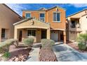 Charming two-story home with a well-maintained yard and attached garage in a friendly community at 6953 Graceful Cloud, Henderson, NV 89011