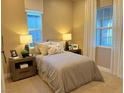 Cozy bedroom with neutral decor and ample natural light at 36 Honeymoon Dr, Henderson, NV 89011