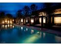 Night view of resort-style pool with luxurious cabanas at 4471 Dean Martin Dr # 801, Las Vegas, NV 89103