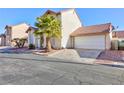 Two-story house with attached garage and side yard at 2732 Sesame Dr, Las Vegas, NV 89142