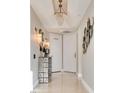Chic hallway featuring modern lighting, decor, and marble flooring at 2747 Paradise Rd # 2206, Las Vegas, NV 89109