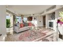 Open-concept living space with fireplace, comfortable seating, and city views at 2747 Paradise Rd # 2206, Las Vegas, NV 89109