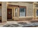 Front door entrance with decorative wood accents above at 537 Kristin Ln, Henderson, NV 89011