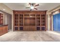 Large built-in entertainment center with ample storage at 9101 Alta Dr # 1406, Las Vegas, NV 89145